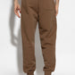 Brown sweatpants with a drawstring on a white background