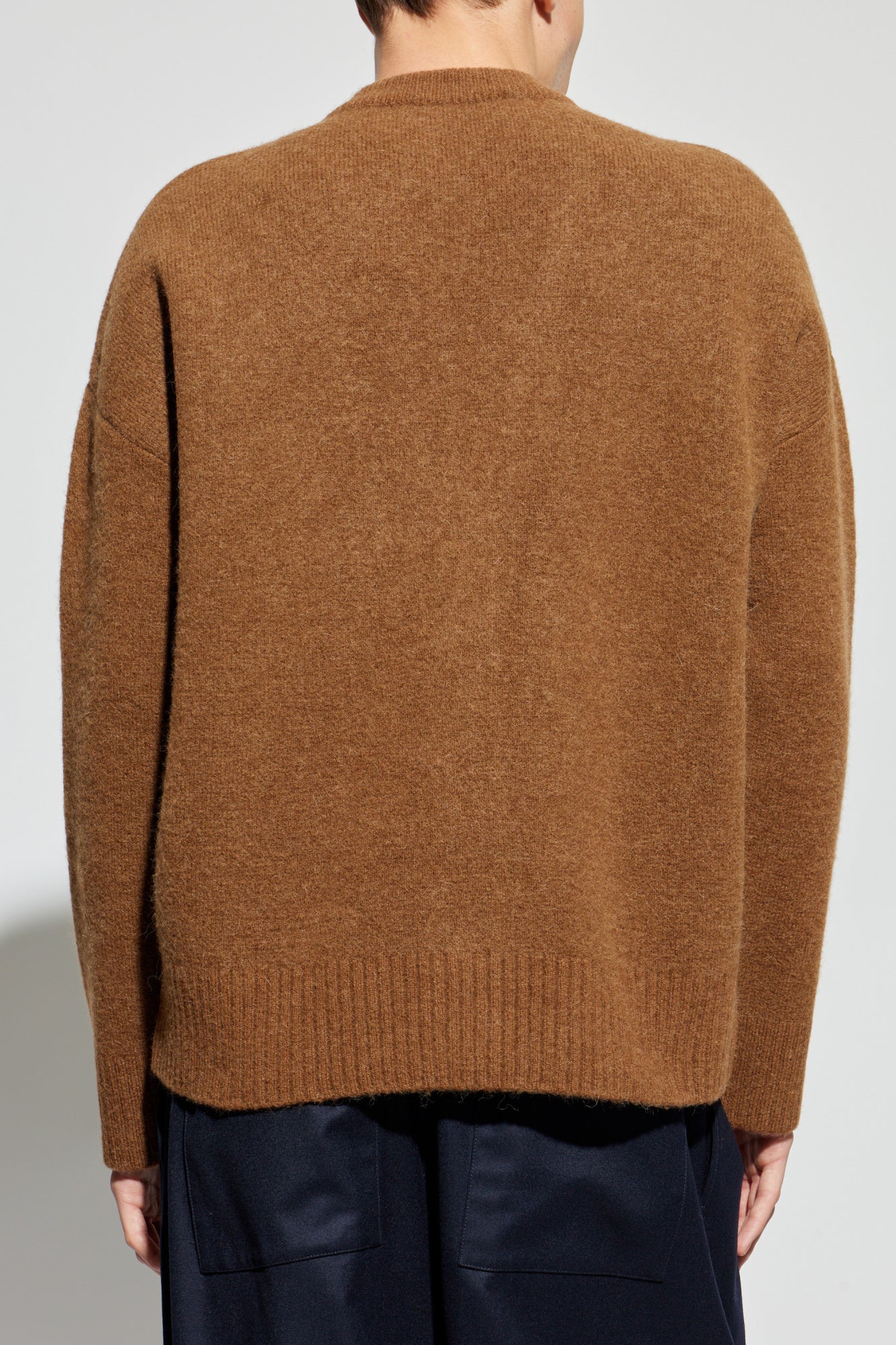 Brown cardigan with a heart and letter 'A' design on a white background ami paris