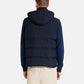 Black puffer vest on a white background