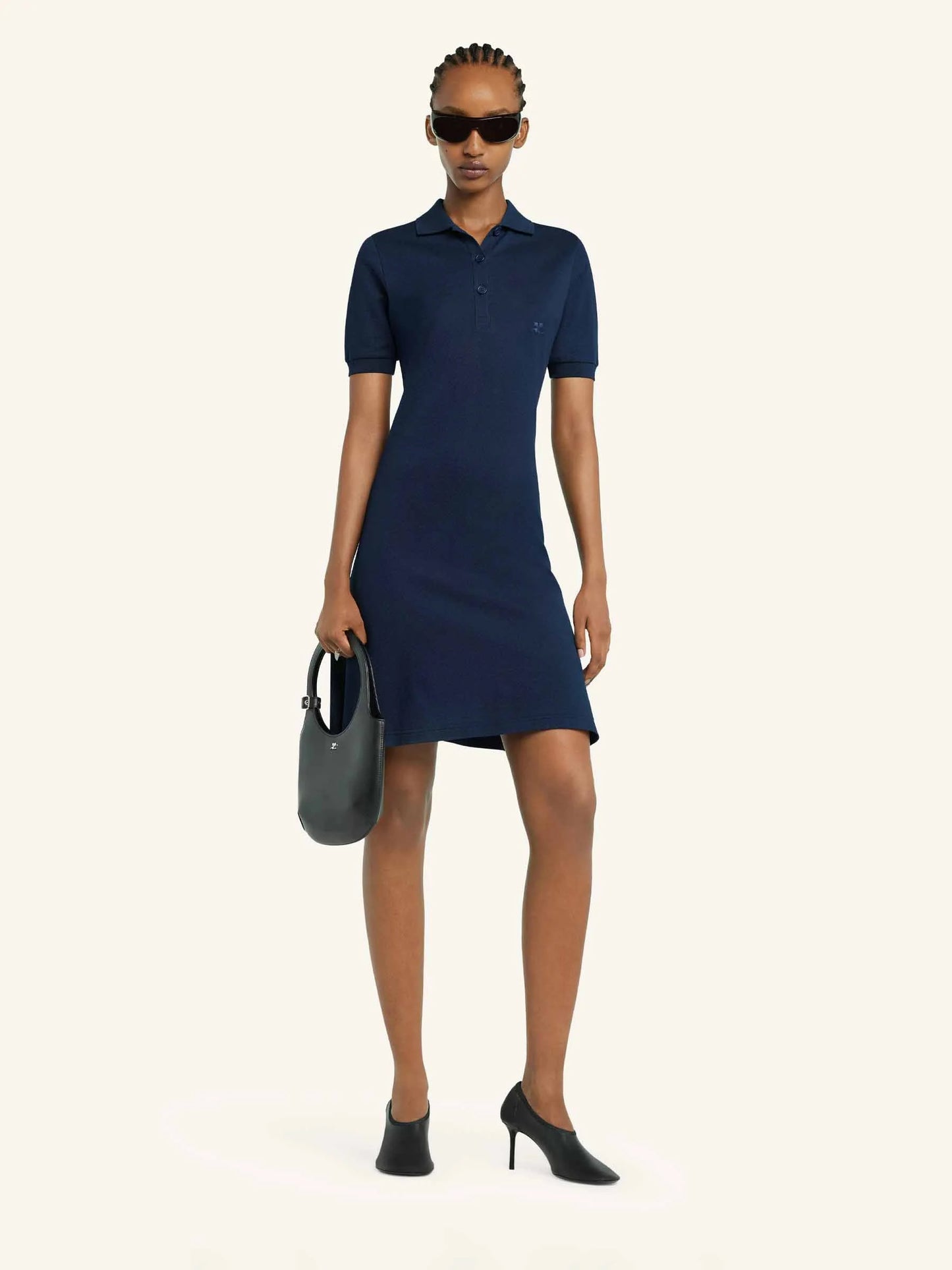 Navy blue dress with a collar on a white background