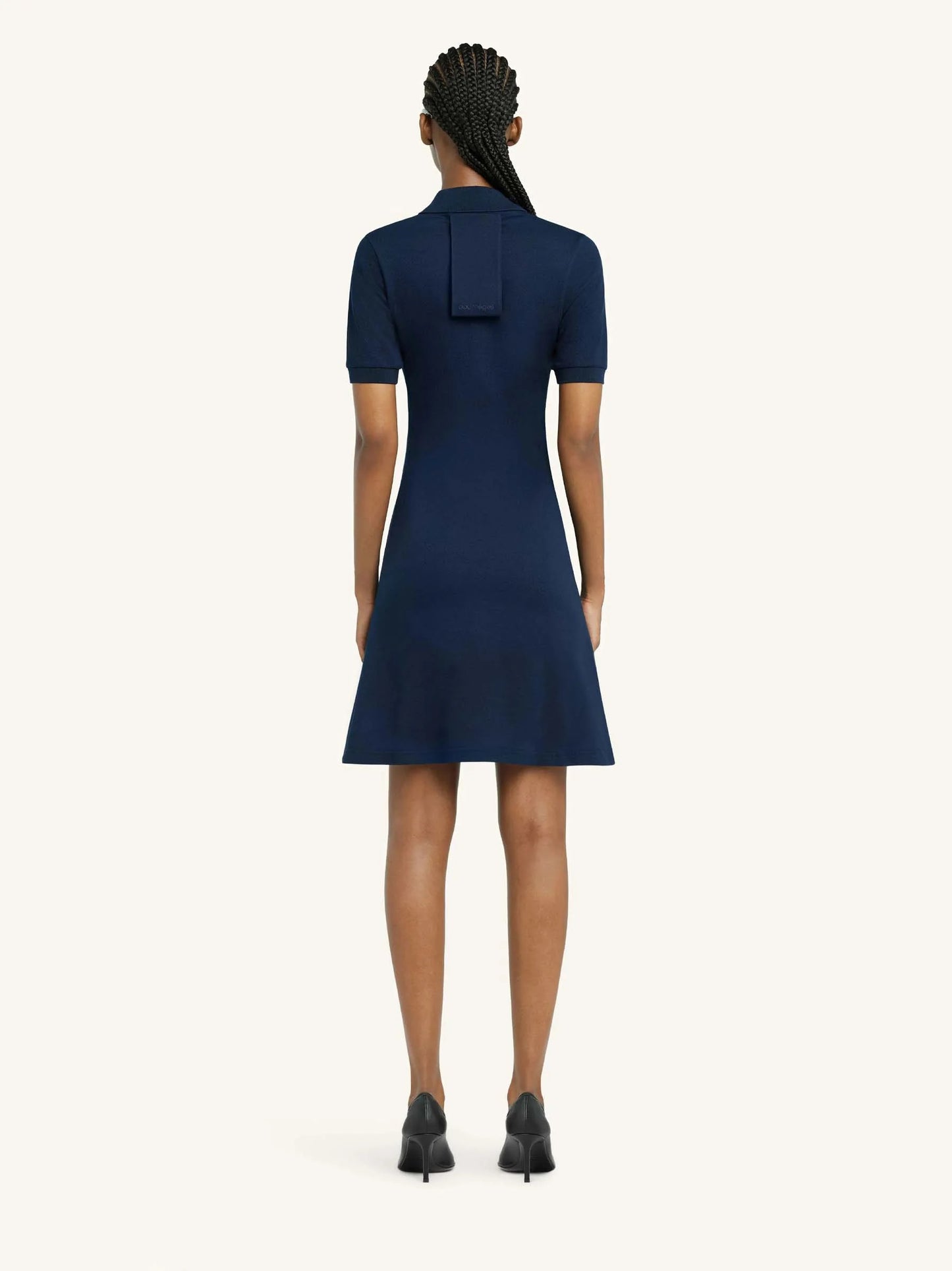 Navy blue dress with a collar on a white background