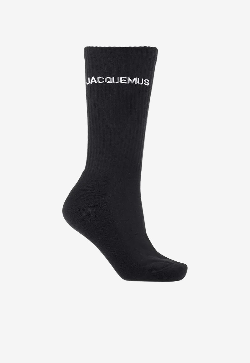 Black sock with 'Jacquemus' branding on a white background