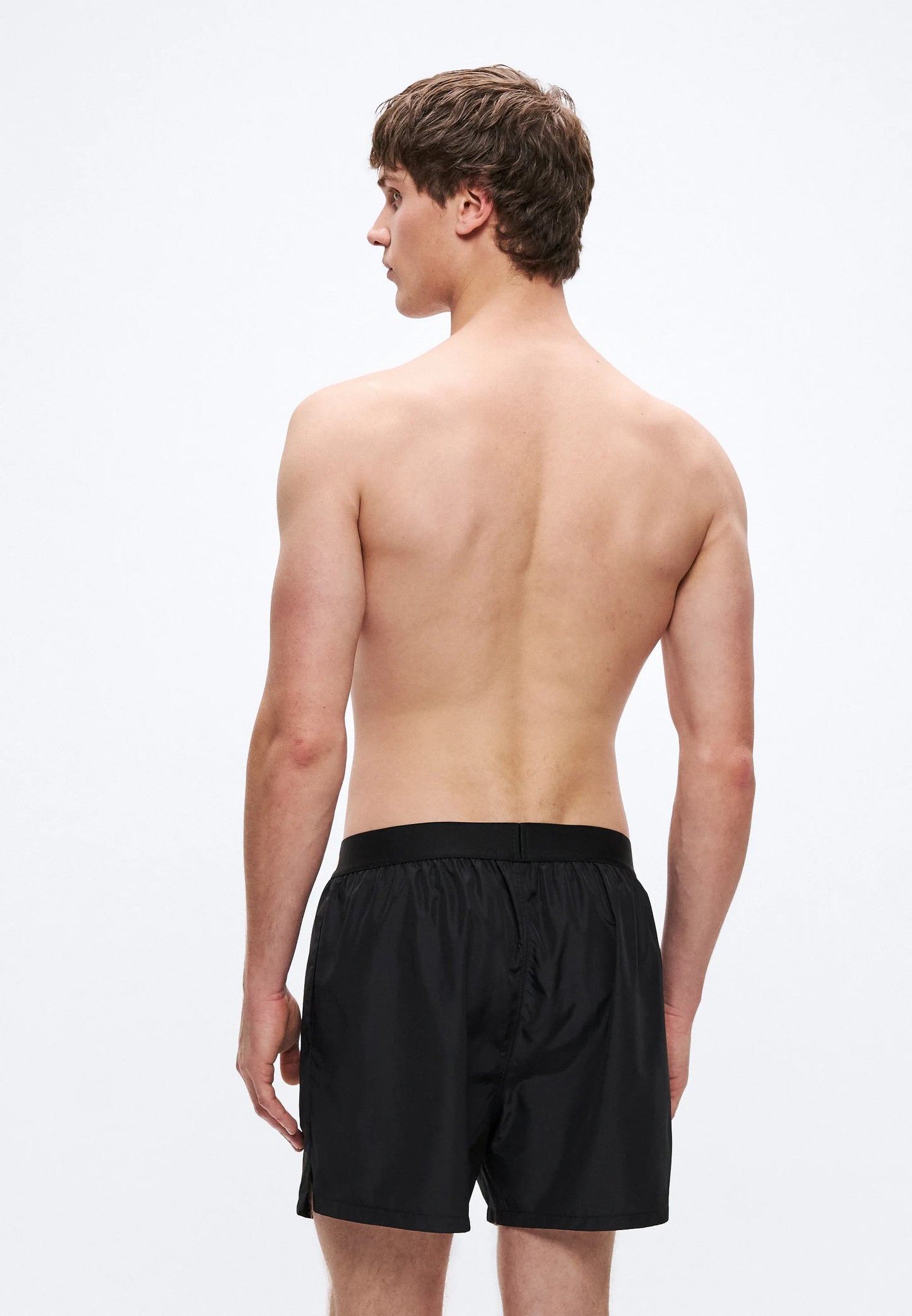 Men's black swim shorts with logo waistband