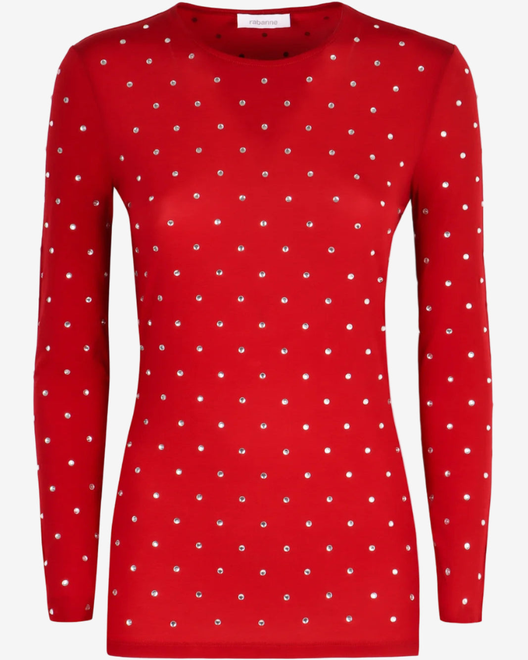 Red long-sleeve top with white polka dot pattern on a white background