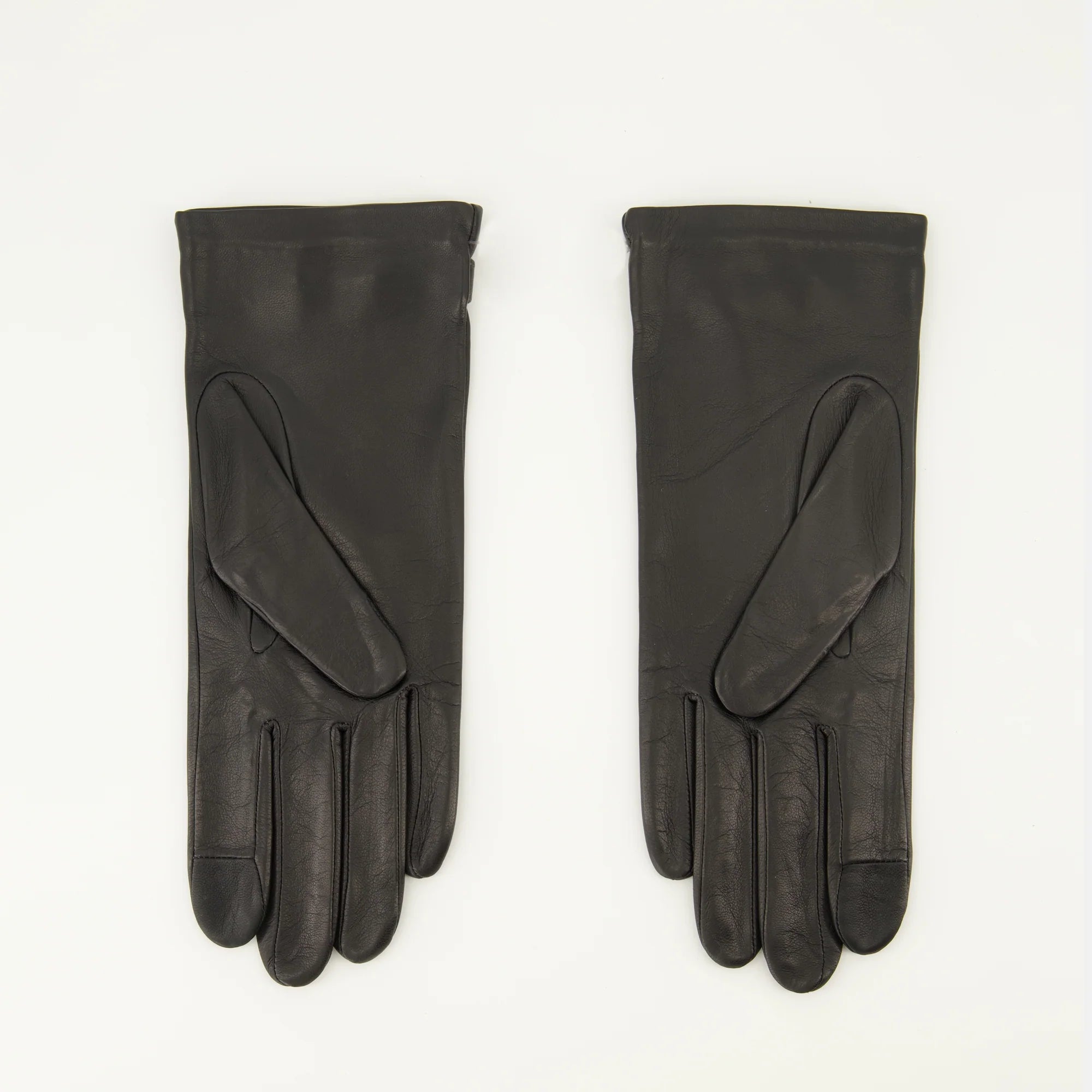 Pair of black gloves with gold logo on a white background AMI PARIS