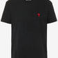 Black t-shirt with a red heart logo on a white background