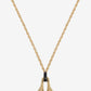 Gold necklace with a unique pendant on a white background