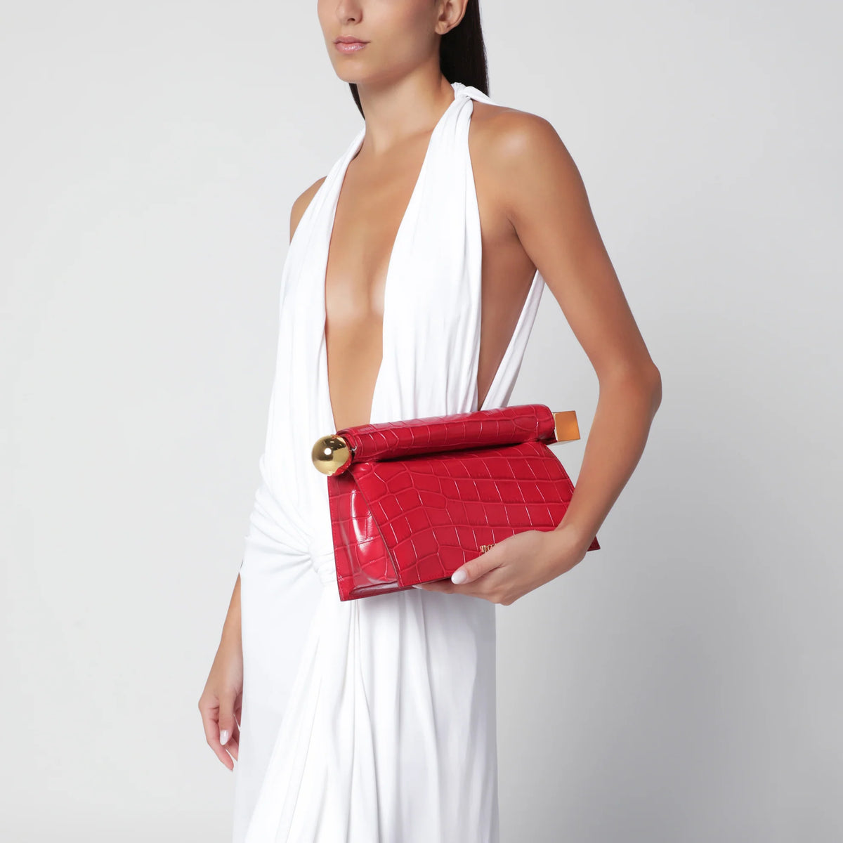 Clutch The red stamped round square pouch