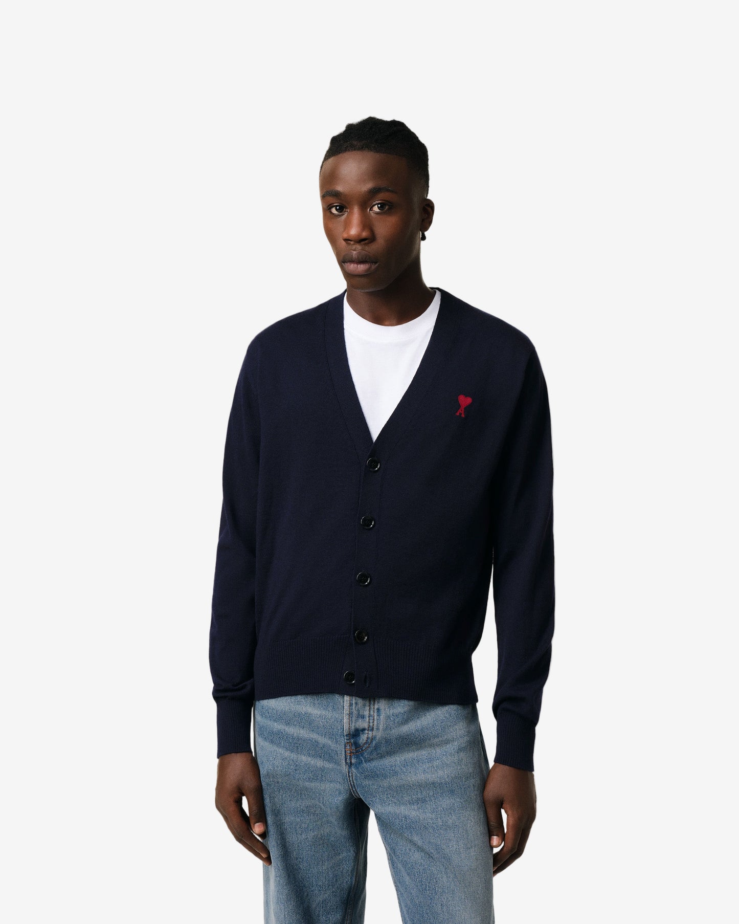 Navy blue cardigan with a red logo on a white background