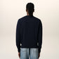 Navy blue sweater with a red heart and letter 'A' logo on a white background