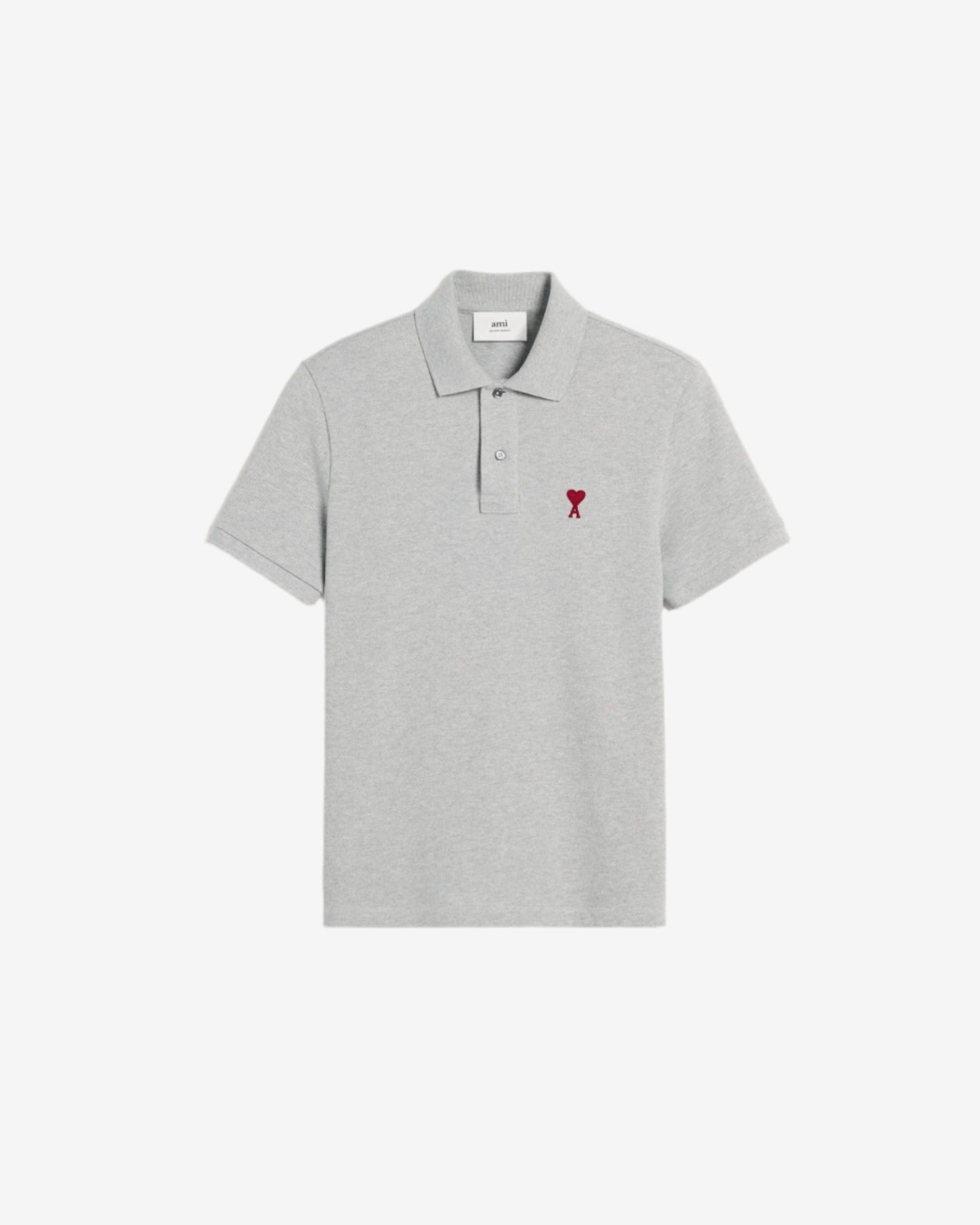 Gray polo shirt with a small red logo on a beige background