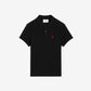 Black polo shirt with a small red logo on a beige background