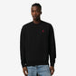 Black sweatshirt with a red logo on a beige background