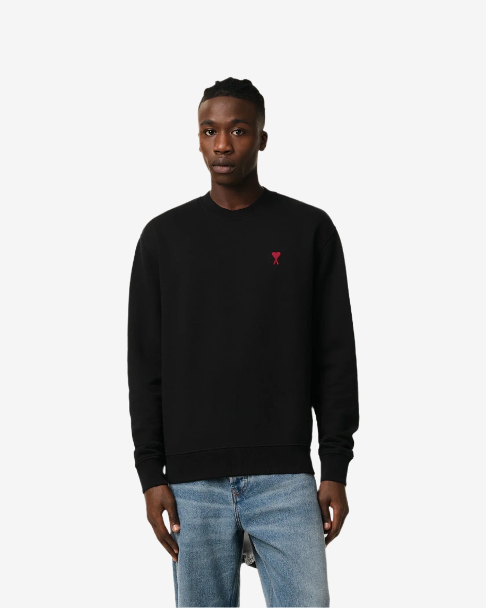 Black sweatshirt with a red logo on a beige background