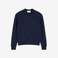 Navy blue sweatshirt with a red logo on a beige background ami paris