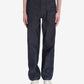 Dark blue jeans worn by a person on a white background