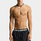 Black shorts with Dsquared2 logo on a light gray background