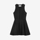 Black sleeveless dress on a light beige background