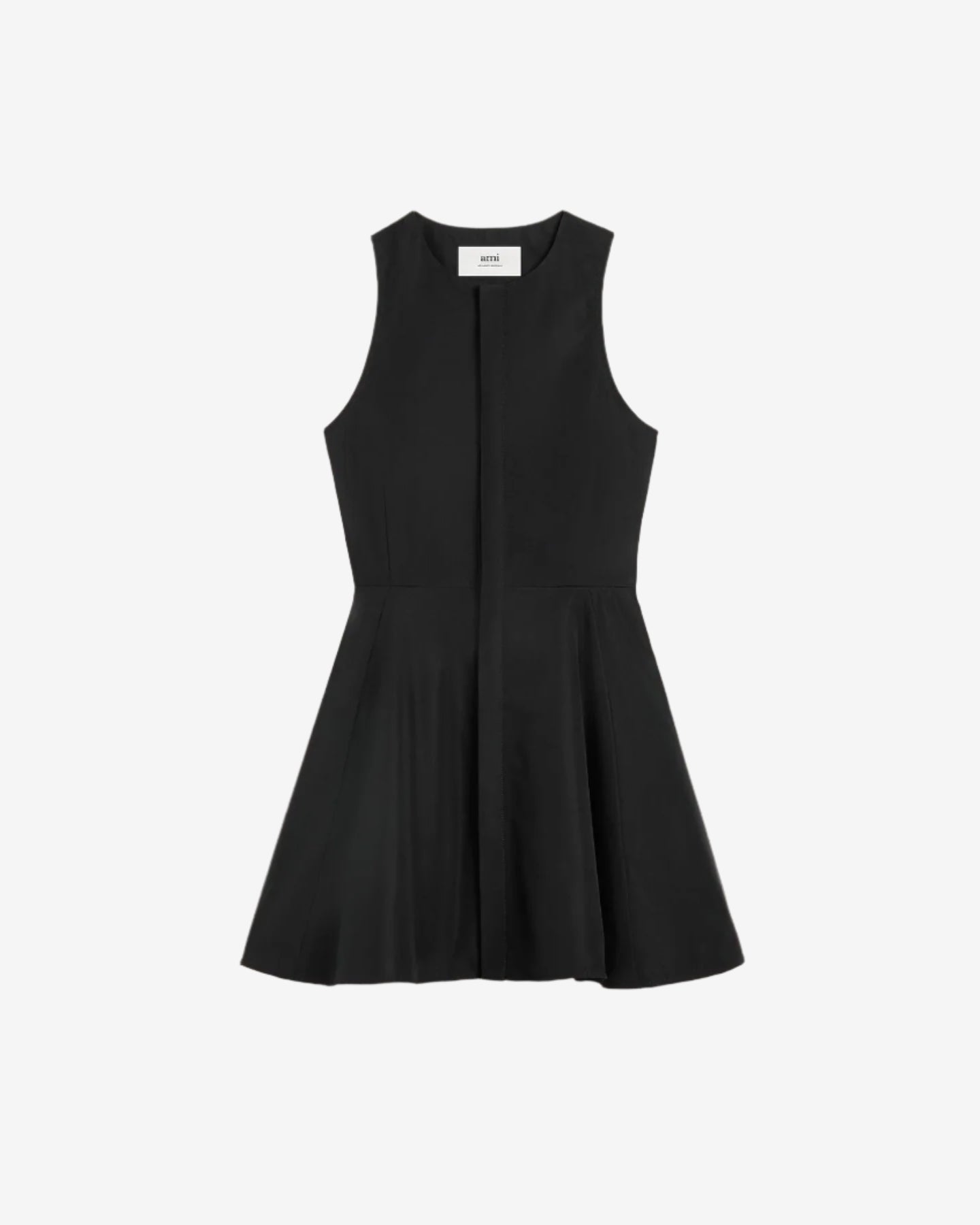 Black sleeveless dress on a light beige background