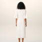 Long dress in light cotton gabardine with short sleeves and bold contrasted topstitches