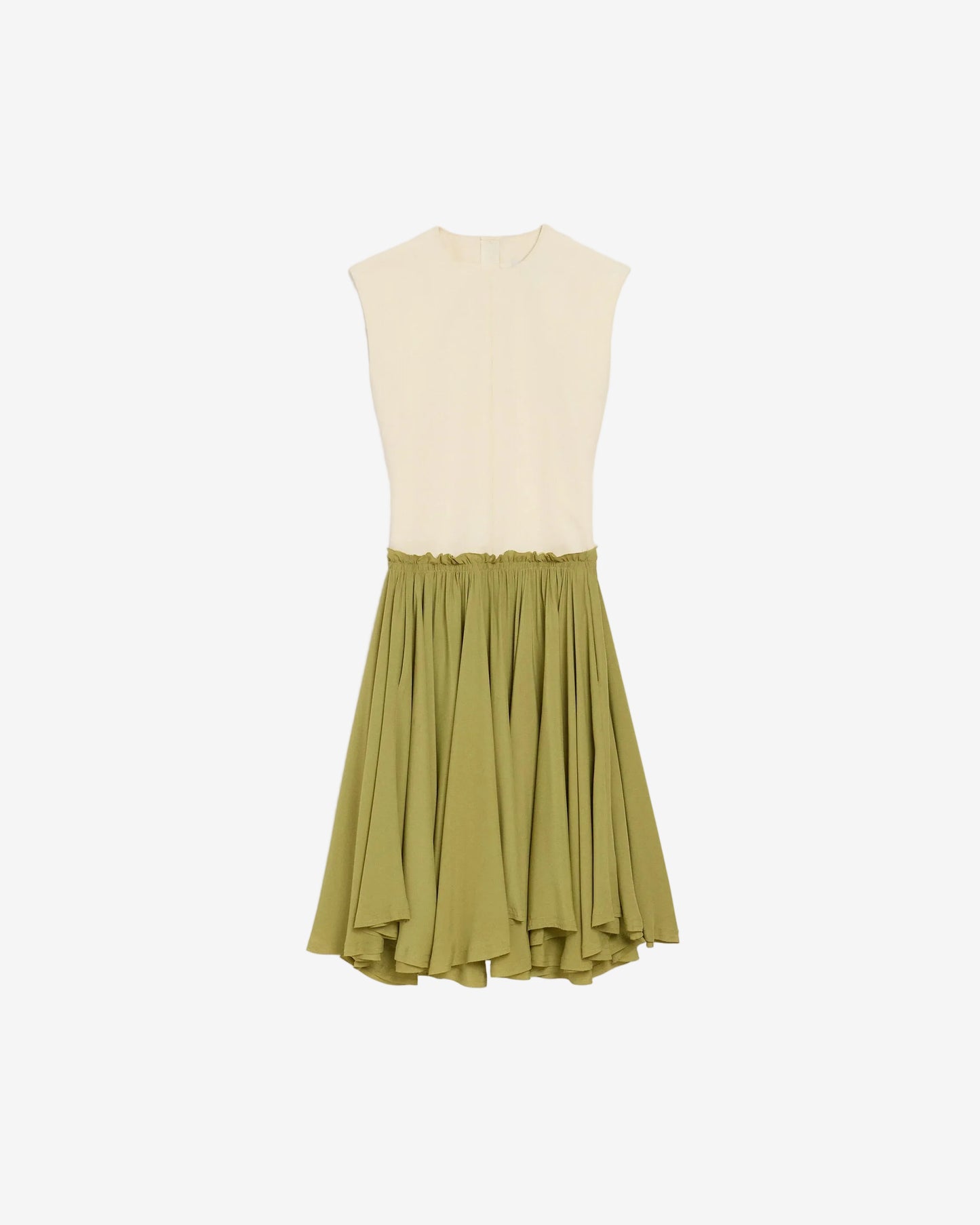 Two-tone dress with cream top and green skirt on a light beige background