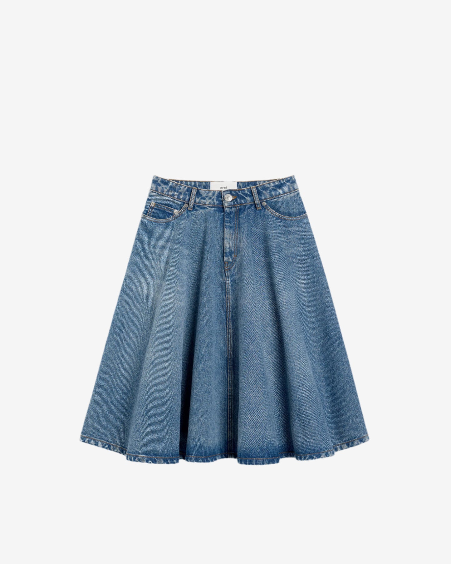 Blue denim skirt on a beige background