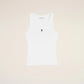 White tank top with a small black design on a beige background