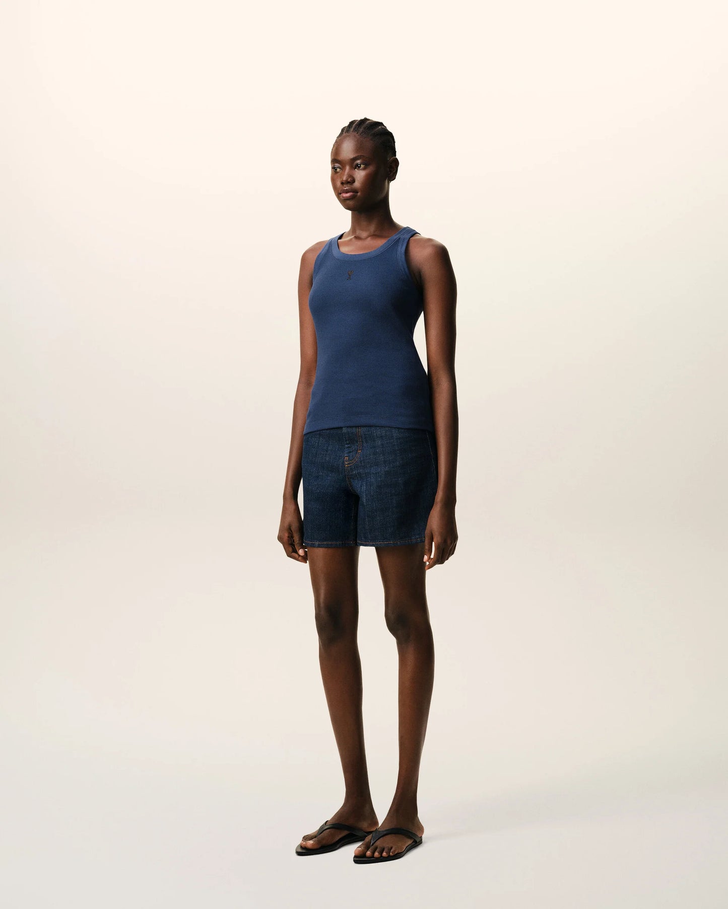 Blue tank top on a beige background
