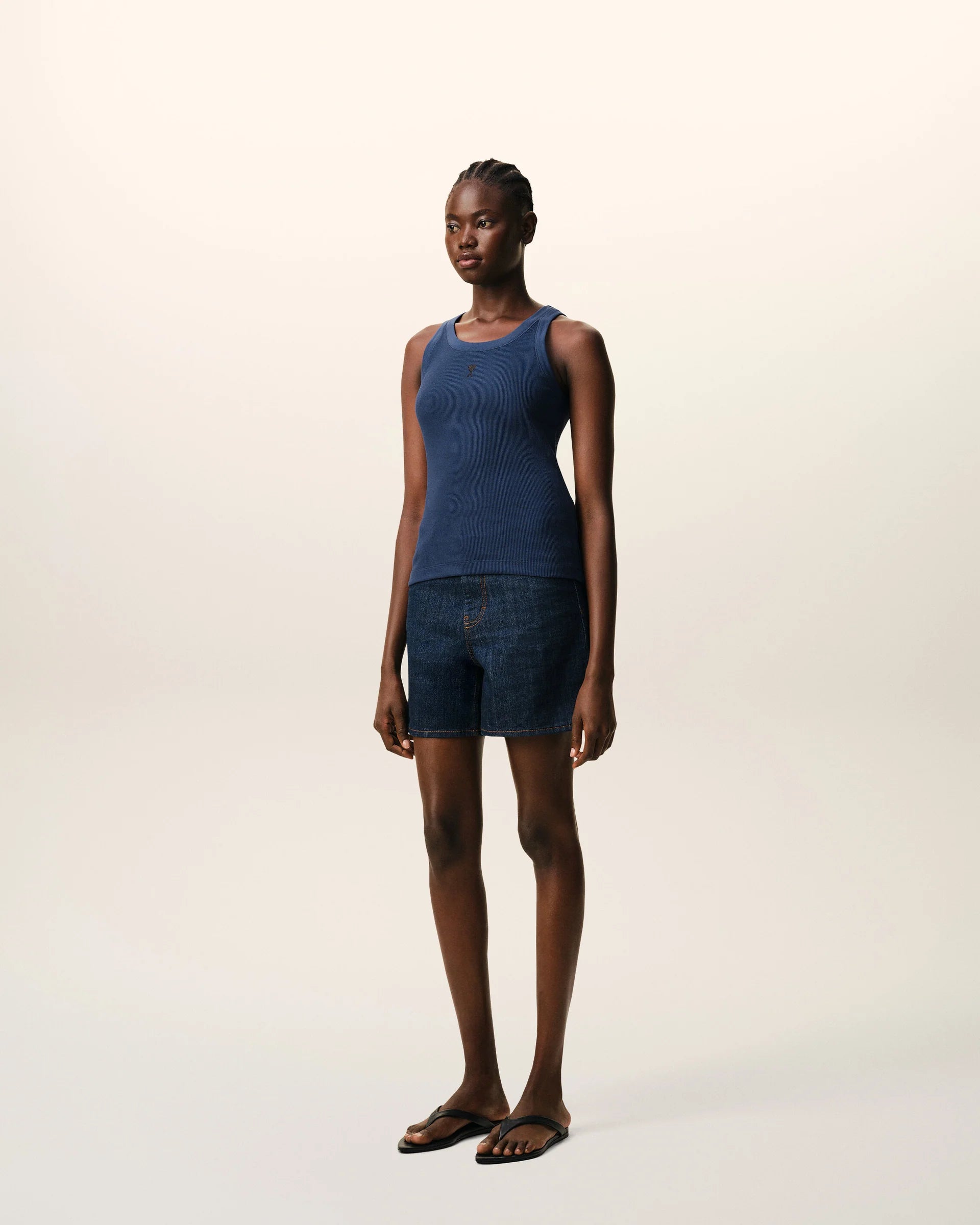 Blue tank top on a beige background