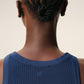 Blue tank top on a beige background