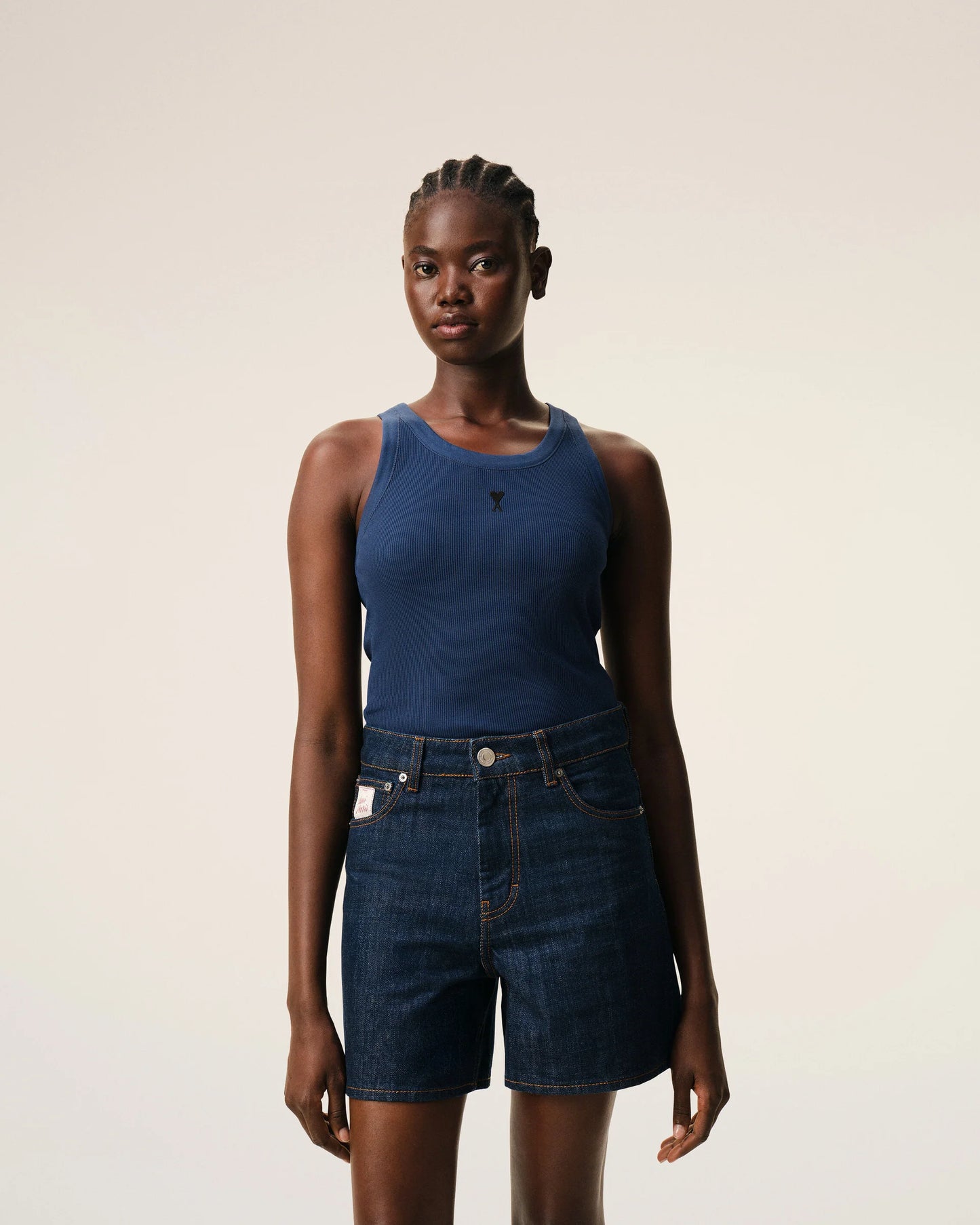 Blue tank top on a beige background