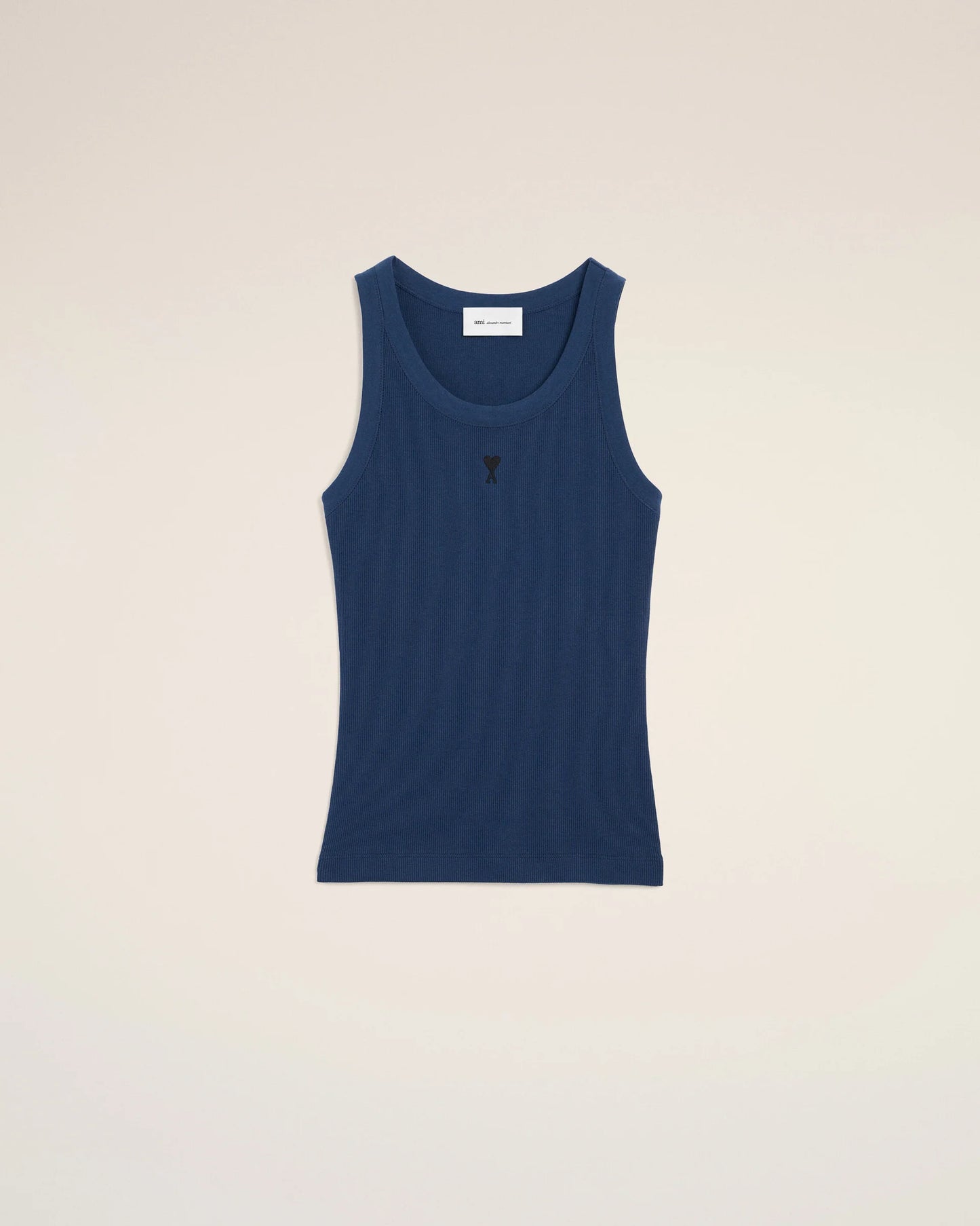 Blue tank top on a beige background