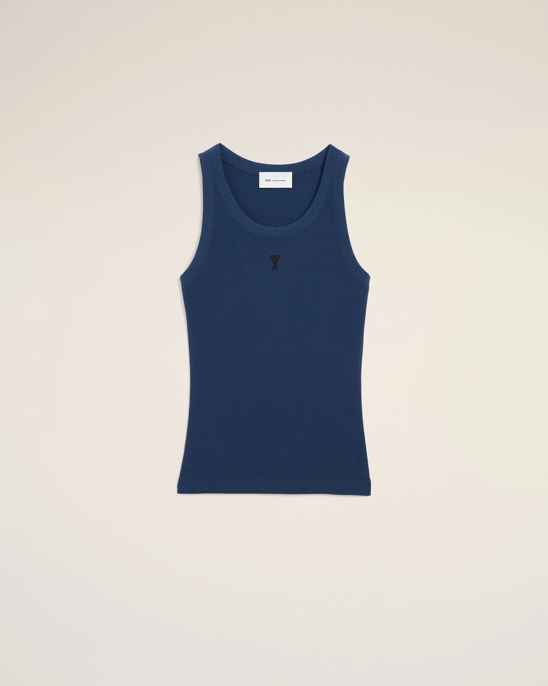 Blue tank top on a beige background