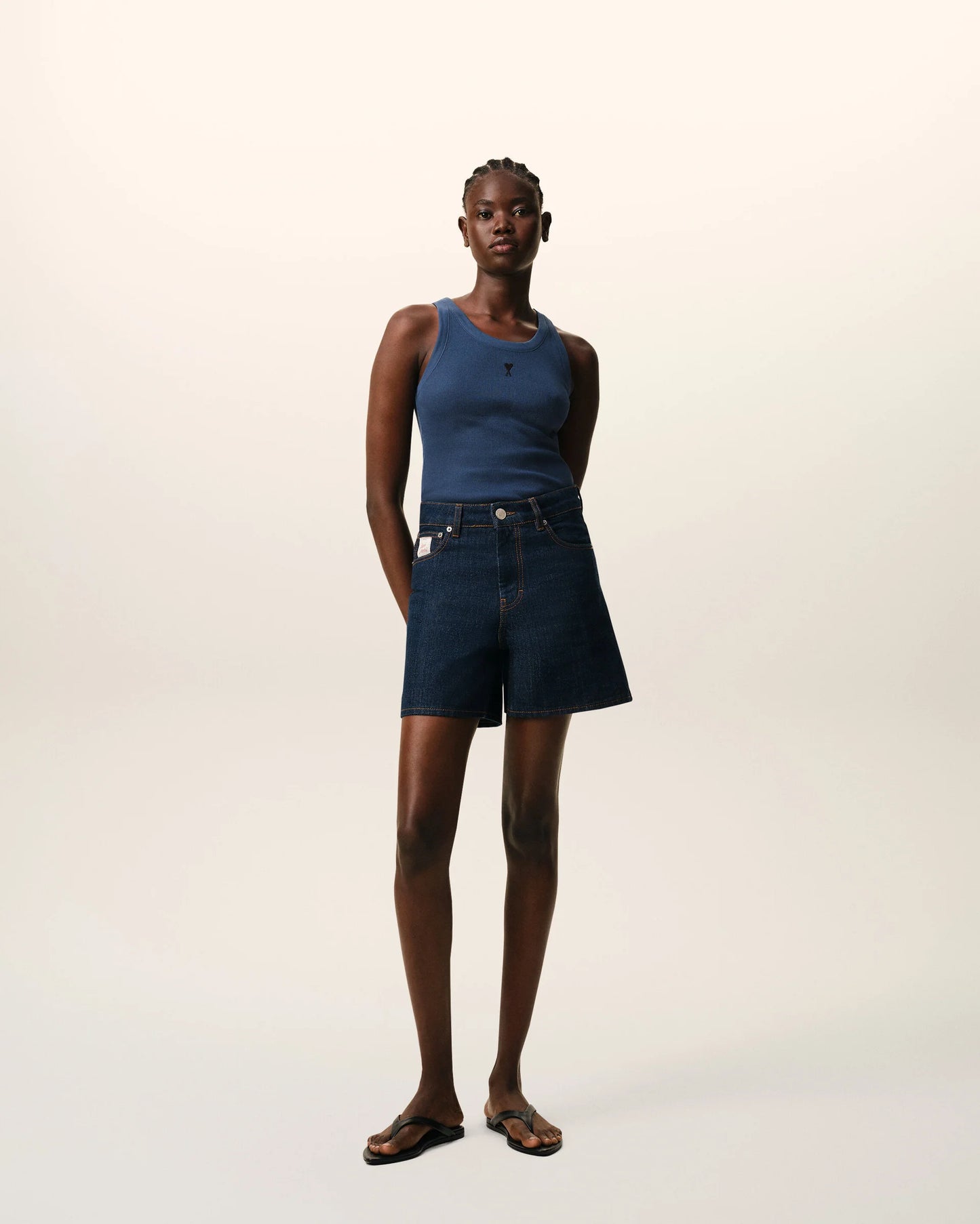 Blue tank top on a beige background