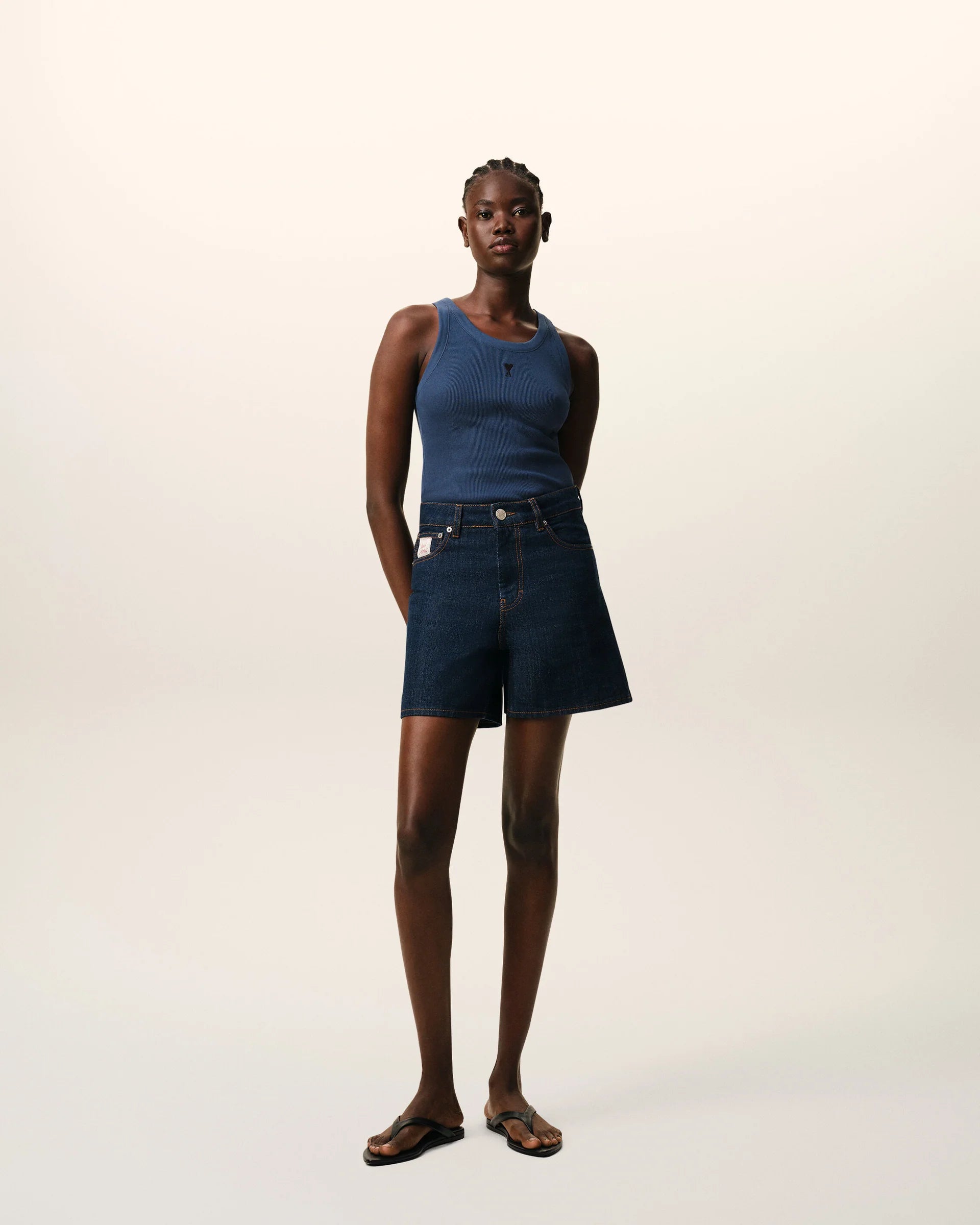 Blue tank top on a beige background