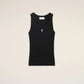 Black tank top with a small white logo on a beige background
