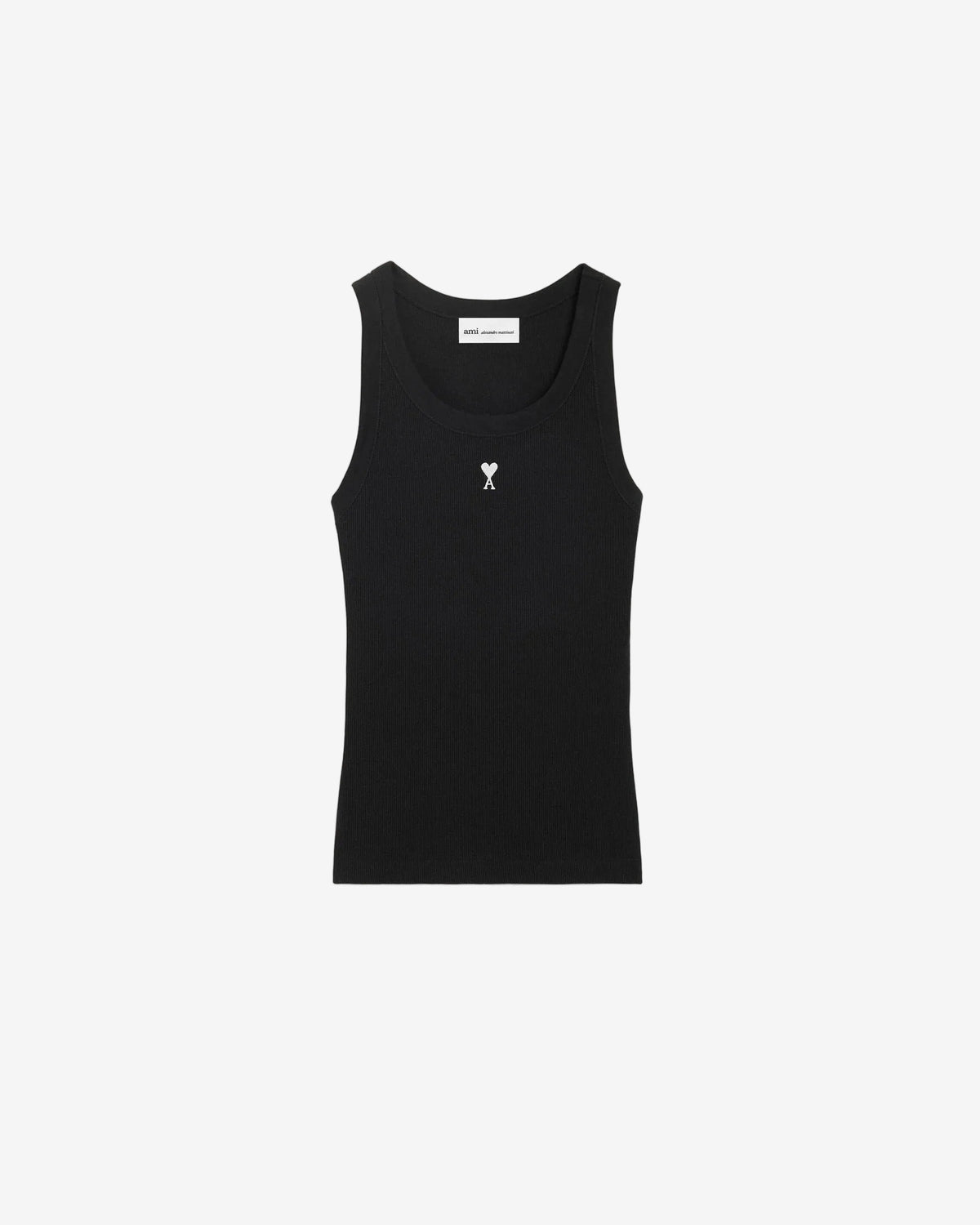 Black tank top with a small white logo on a beige background