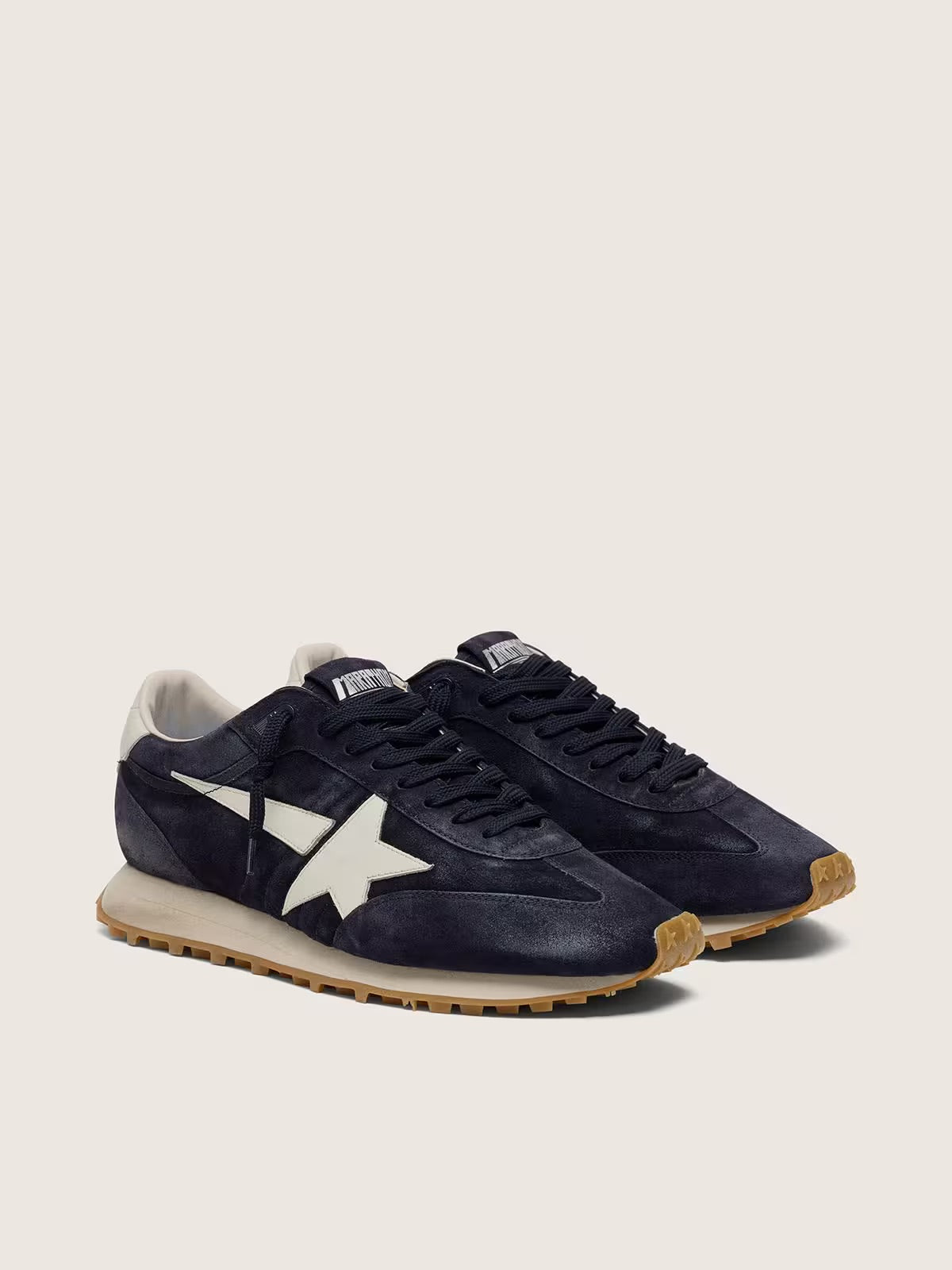 Men’s Marathon in blue navy suede with white leather star and heel tab