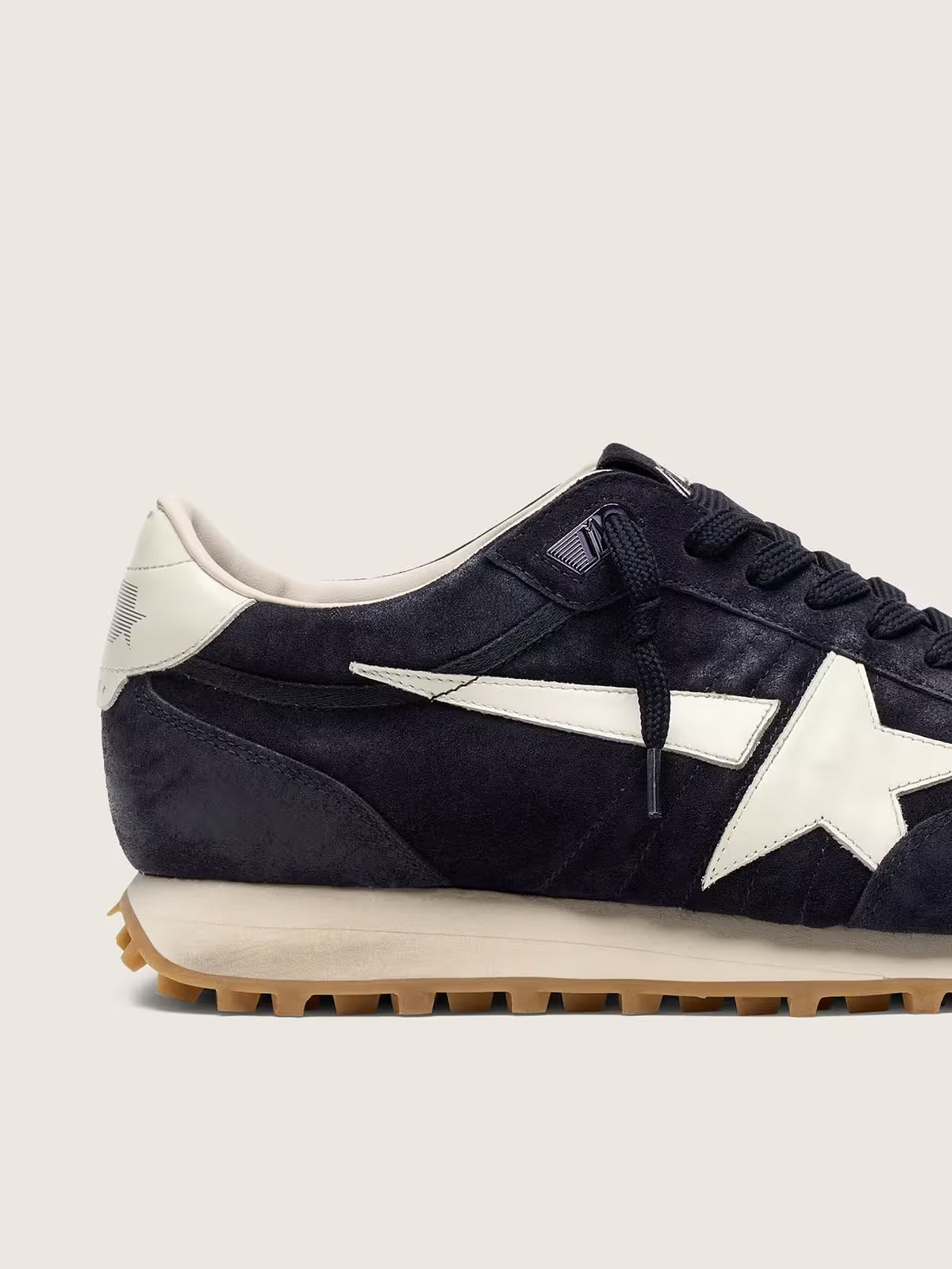 Men’s Marathon in blue navy suede with white leather star and heel tab