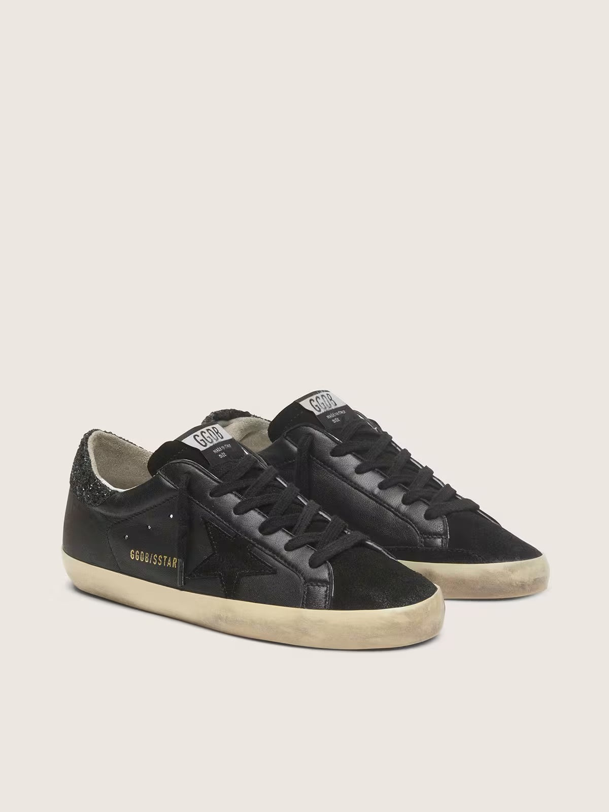 Women's Super-Star in black nappa with black star and glitter heel tab