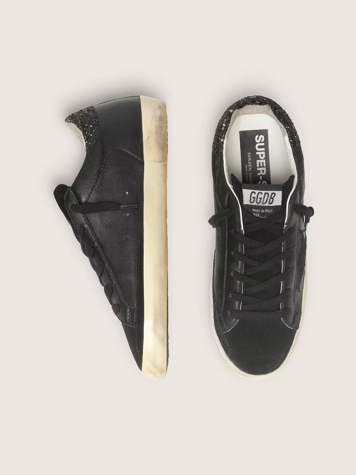 Women's Super-Star in black nappa with black star and glitter heel tab
