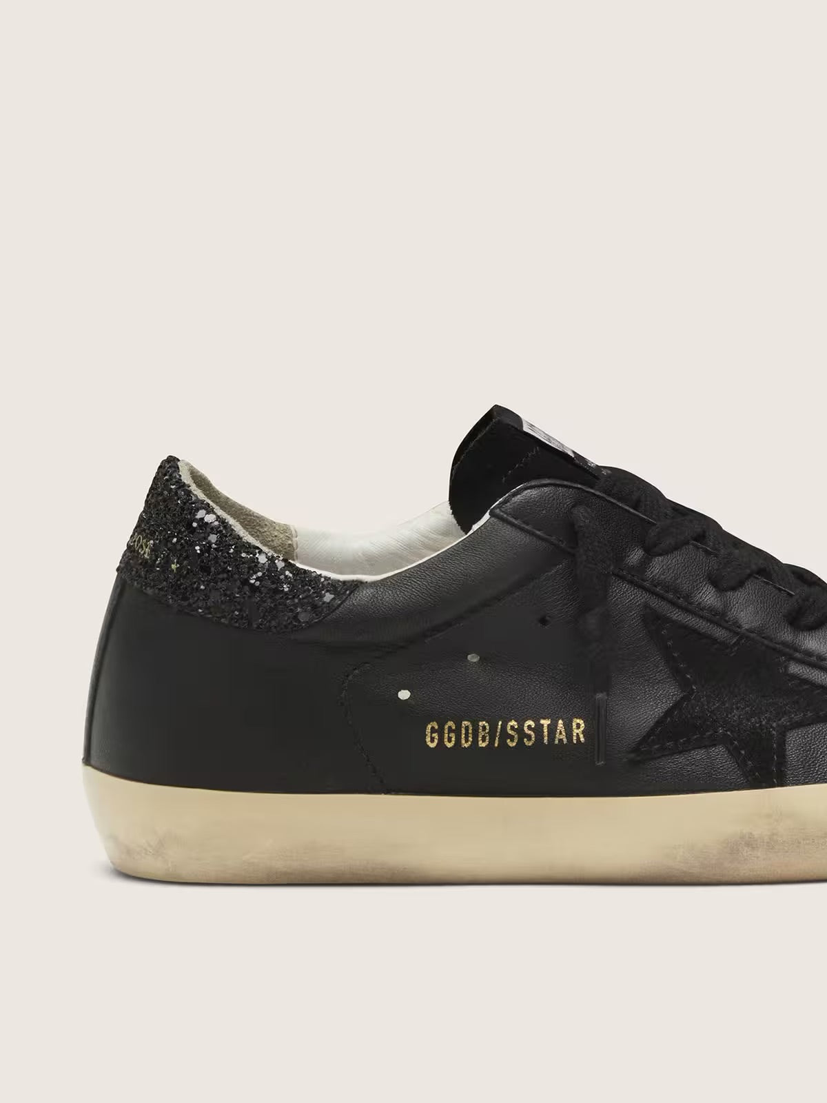 Women's Super-Star in black nappa with black star and glitter heel tab