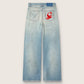 Women's jeans in light blue denim with Golden embroidered logo