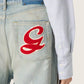 Women's jeans in light blue denim with Golden embroidered logo