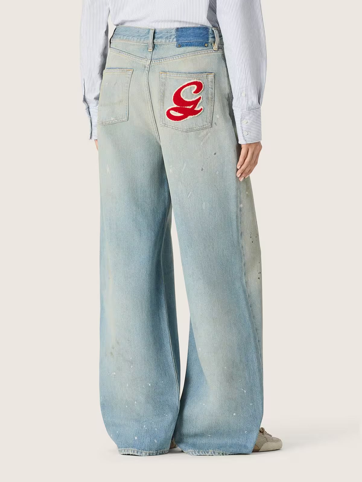 Women's jeans in light blue denim with Golden embroidered logo