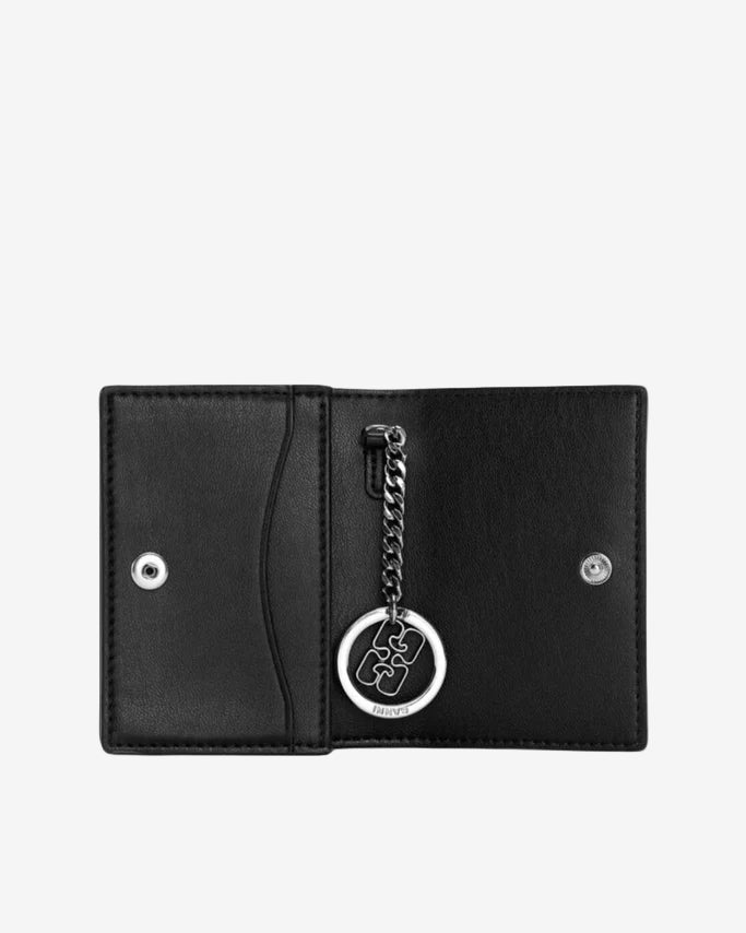 Black wallet with a keychain on a white background