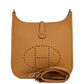 Brown leather handbag with brand logo on a white background hermes 