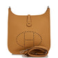 Brown leather handbag with brand logo on a white background hermes 