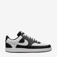 Black and white sneaker with Nike logo on a white background