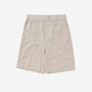 Beige shorts on a white background